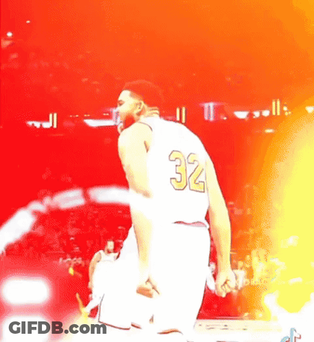 A Basketball Player Wearing A White Jersey With The Number 32 On The Back GIF