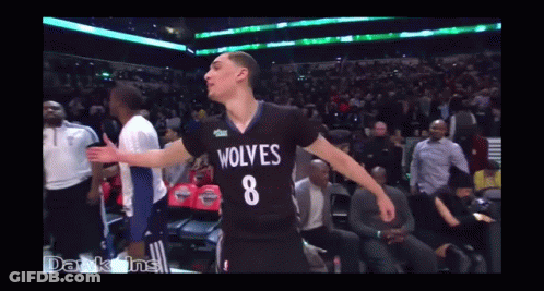 A Basketball Player Wearing A Wolves Jersey With The Number 8 GIF