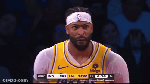 A Basketball Player Wearing A Yellow Jersey That Says Bibigo GIF