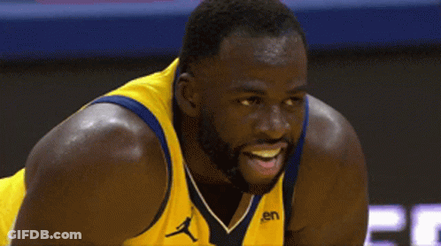 A Basketball Player Wearing A Yellow Jersey That Says En GIF
