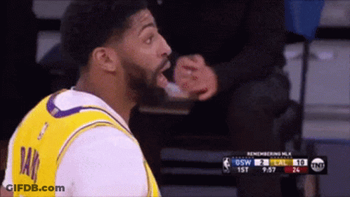 A Basketball Player Wearing A Yellow Jersey That Says Ray On It GIF