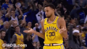 A Basketball Player Wearing A Yellow Jersey That Says Warriors On It GIF