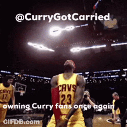 A Basketball Player Wearing A Yellow Jersey With Cavs On It GIF