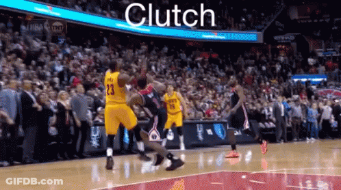 A Basketball Player Wearing A Yellow Jersey With The Number 23 On It Is Jumping In The Air GIF