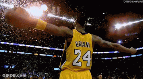 A Basketball Player Wearing A Yellow Jersey With The Number 24 On It GIF