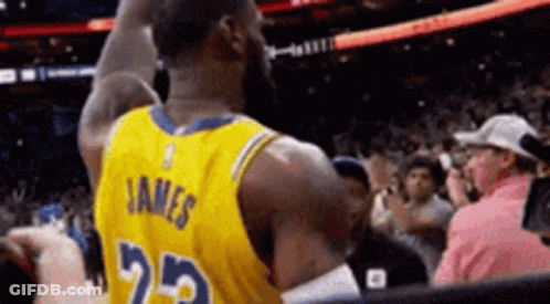 A Basketball Player Wearing A Yellow Jersey With The Number 25 On The Back GIF