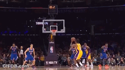 A Basketball Player Wearing A Yellow Lakers Jersey With The Number 0 On His Chest GIF