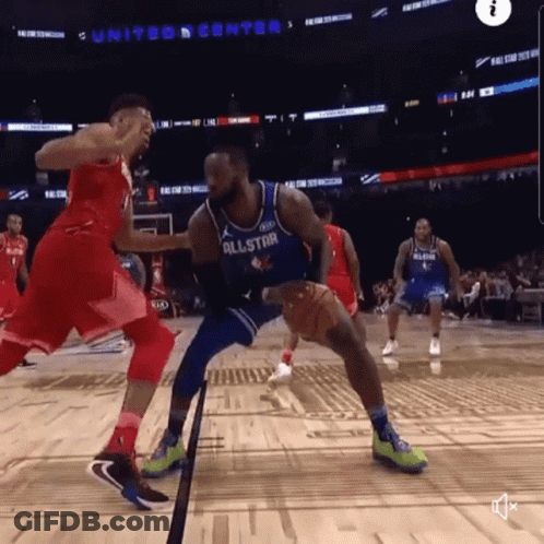 A Basketball Player Wearing An All Star Jersey Dribbles The Ball GIF