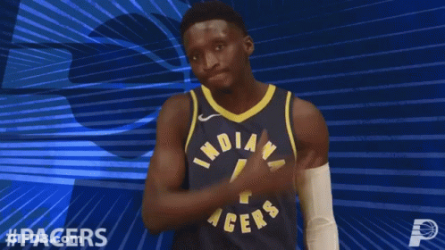 A Basketball Player Wearing An Indiana Pacers Jersey GIF