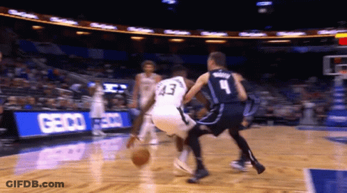 A Basketball Player Wearing Number 43 Dribbles The Ball GIF