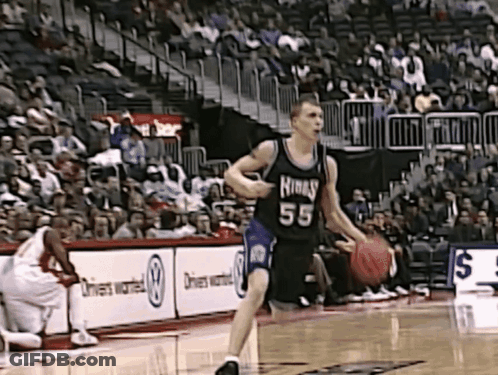 A Basketball Player Wearing Number 55 Dribbles The Ball GIF