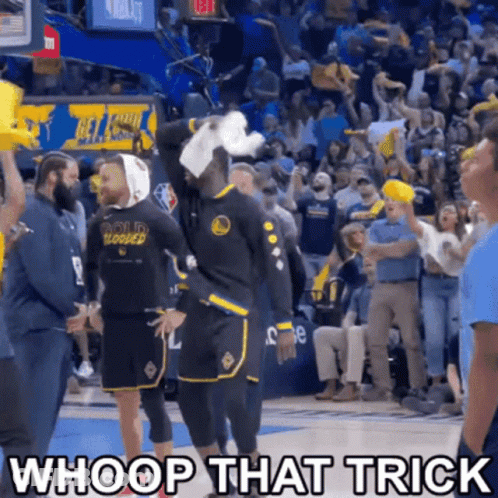 A Basketball Player With A Bandage On His Head Is Standing In Front Of A Crowd And Says Whoop That Trick GIF