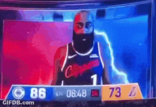 A Basketball Player With A Beard Is Standing In Front Of A Scoreboard With The Number 1 On It GIF