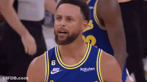 A Basketball Player With A Beard Is Wearing A Blue And Yellow Jersey With Rakuten On It . GIF