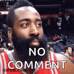 A Basketball Player With A Beard Is Wearing A Red Jersey And Making A No Comment Face . GIF