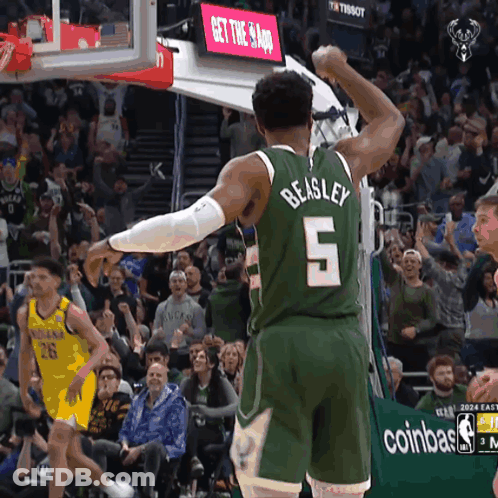A Basketball Player With Beasley 5 On His Jersey GIF