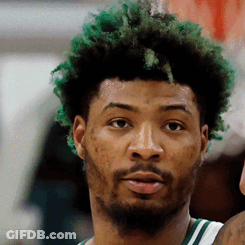 A Basketball Player With Green Hair And A Beard GIF