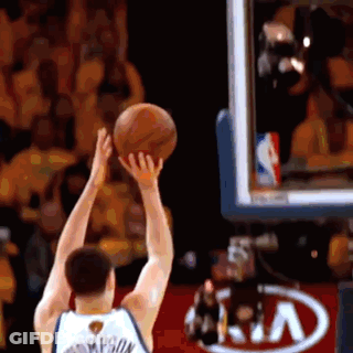 A Basketball Player With The Name Thompson On His Jersey Throws A Basketball GIF
