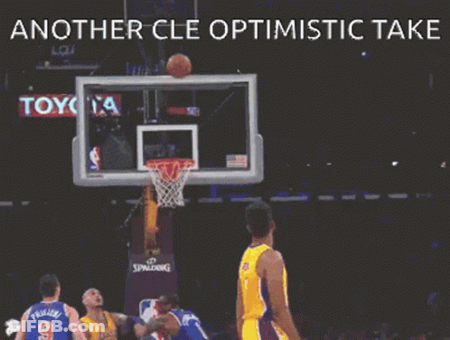 A Basketball Player With The Number 0 On His Jersey Throws A Basketball Into A Hoop GIF