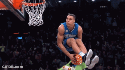 A Basketball Player With The Number 00 On His Jersey Is Dunking The Ball GIF