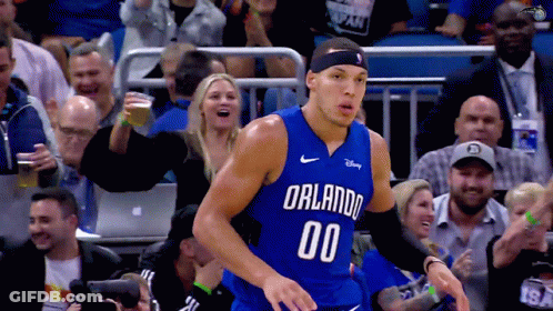 A Basketball Player With The Number 00 On His Shirt GIF