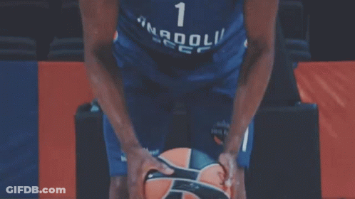 A Basketball Player With The Number 1 On His Jersey Holds A Basketball GIF
