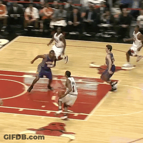 A Basketball Player With The Number 1 On His Jersey Is Dribbling The Ball GIF