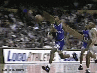 A Basketball Player With The Number 1 On His Jersey Is Dribbling The Ball On A Court . GIF