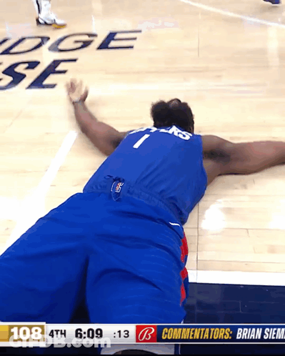 A Basketball Player With The Number 1 On His Jersey Is Laying On The Court GIF
