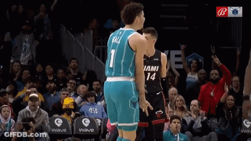 A Basketball Player With The Number 1 On His Jersey Is Standing Next To Another Player With The Number 14 On Their Jerse GIF