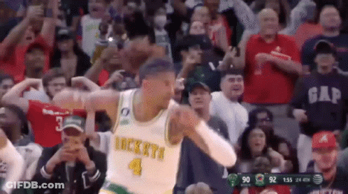 A Basketball Player With The Number 1 On His Jersey Is Surrounded By Fans GIF