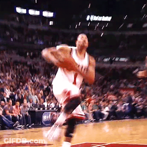 A Basketball Player With The Number 1 On His Jersey Jumps Into The Air GIF
