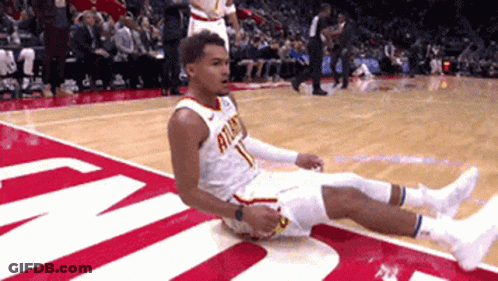 A Basketball Player With The Number 1 On His Jersey Lays On The Floor GIF