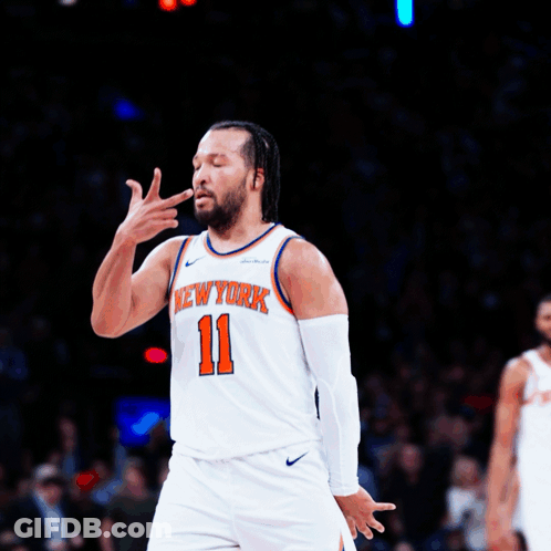 A Basketball Player With The Number 11 On His Jersey GIF