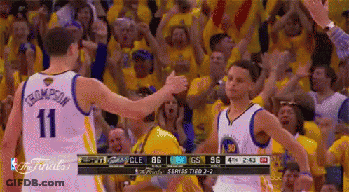 A Basketball Player With The Number 11 On His Jersey Is Giving A High Five To Another Player . GIF