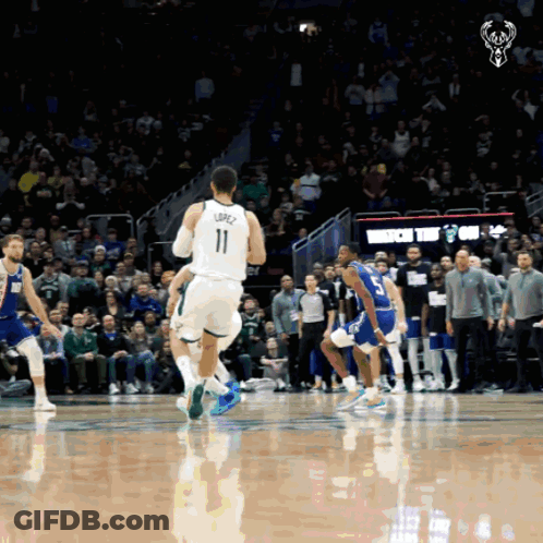 A Basketball Player With The Number 11 On The Back Of His Shirt GIF