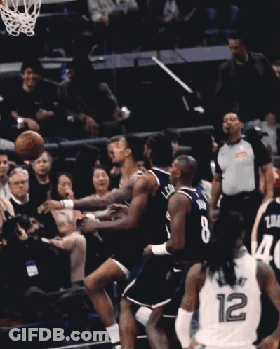 A Basketball Player With The Number 12 On His Back GIF