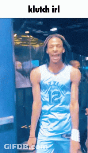 A Basketball Player With The Number 12 On His Shirt GIF