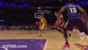 A Basketball Player With The Number 13 On His Back Dribbles The Ball GIF