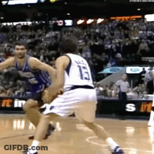 A Basketball Player With The Number 13 On His Jersey Is Dribbling The Ball GIF