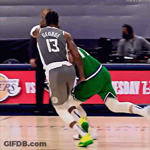A Basketball Player With The Number 13 On His Jersey Is Fighting Another Player GIF