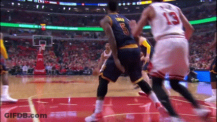A Basketball Player With The Number 13 On His Jersey Is Playing Basketball GIF