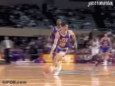 A Basketball Player With The Number 13 On His Jersey Runs On The Court GIF