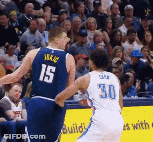 A Basketball Player With The Number 15 On His Back GIF