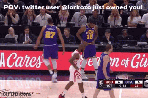 A Basketball Player With The Number 15 On His Jersey Stands On The Court GIF