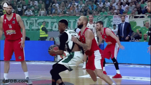 A Basketball Player With The Number 16 On His Jersey Is Dribbling The Ball GIF