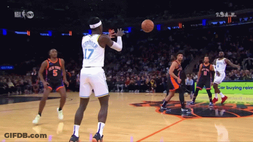 A Basketball Player With The Number 17 On His Back Is About To Throw The Ball GIF