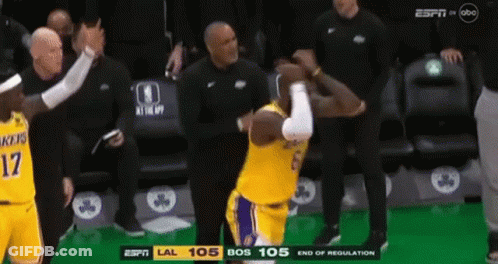 A Basketball Player With The Number 17 On His Jersey Is Standing In Front Of A Referee . GIF