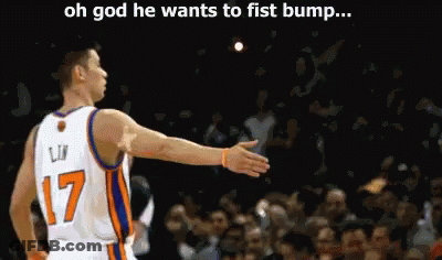 A Basketball Player With The Number 17 On His Jersey Stands In Front Of A Crowd GIF