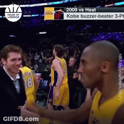 A Basketball Player With The Number 18 On His Jersey Is Talking To Another Player GIF